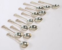 Twelve Elizabeth II silver soup spoons, Sheffield 1960 and 1983, maker Walker & Hall, with kings