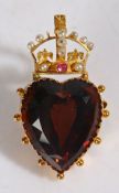 18 carat gold crowned heart brooch, the pearl set crown with a central ruby and heart cut stone,