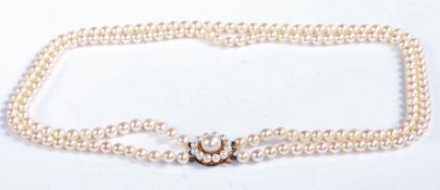 Large and good pearl two strand necklace and pendant, the pendant set with a central pearl set on