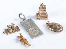 Four 9 carat gold charm bracelet charms, to include the treaty stone Limerick, locket, figure