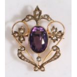 A 9 carat gold pearl and amethyst set brooch, the oval amethyst with a pearl on leaf et surround,