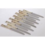 Twelve Elizabeth II silver handled table knives, Sheffield 1960 and 1983, maker Walker & Hall,