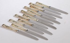 Twelve Elizabeth II silver handled table knives, Sheffield 1960 and 1983, maker Walker & Hall,