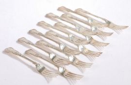 Twelve Elizabeth II silver table forks, Sheffield 1960 and 1983, maker Walker & Hall, with kings