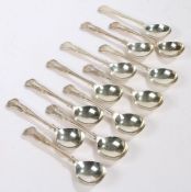 Twelve Elizabeth II silver soup spoons, Sheffield 1960 and 1983, maker Walker & Hall, with kings