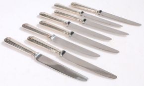 Set of eight Elizabeth II silver handled dessert knives, London 1965, maker C. J. Vander Ltd. with