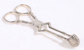 Pair of George II period silver sugar tongs, unmarked, circa 1740, the scissor action tongs with