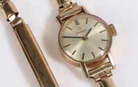 Omega 9 carat gold ladies wristwatch, the signed silver dial with baton markers, manual wound, the