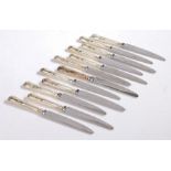 Twelve Elizabeth II silver handled table knives, Sheffield 1960 and 1983, maker Walker & Hall,