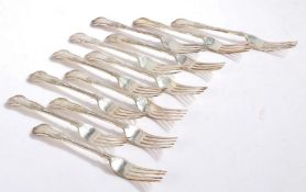 Twelve Elizabeth II silver table forks, Sheffield 1960 and 1983, maker Walker & Hall, with kings
