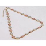 A 9 carat gold and pearl necklace, with halved pink and white pearls, 46cm long, 10g