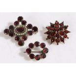 Three 19th Century brooches, the first with a pearl set centre and projecting garnets, 37mm