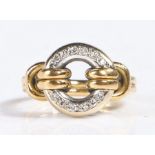 18 carat gold ring and diamond ring, the head set diamonds formed in a circle, stamped 18k, weight