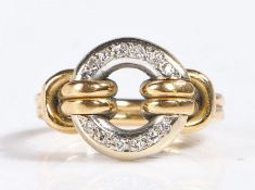 18 carat gold ring and diamond ring, the head set diamonds formed in a circle, stamped 18k, weight