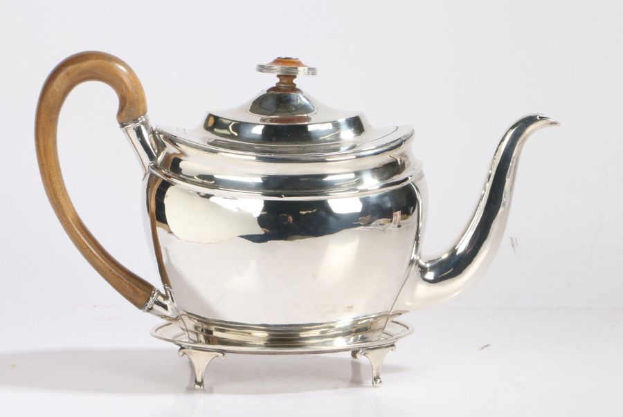 A George III silver teapot and stand, London 1804, maker Alexander Field, the teapot of ovoid form