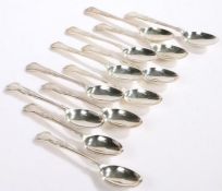 Twelve Elizabeth II silver dessert spoons, Sheffield 1960 and 1983, maker Walker & Hall, with