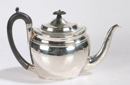 A George III silver teapot, London 1802, maker Alexander Field, of ovoid form with hinged lid,