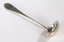 An early 20th century Polish .800 silver ladle, makers mark SG, the handle with pointed terminal,