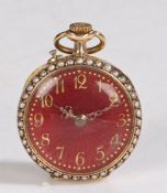 Swiss 14 carat gold and seed pearl ladies pocket watch, the red enamel dial with Arabic markers