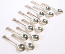 Twelve Elizabeth II silver soup spoons, Sheffield 1960 and 1983, maker Walker & Hall, with kings