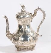 Victorian silver coffee pot, Sheffield 1855, maker JW, the foliate and scroll embossed lid with bird