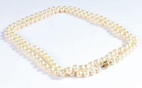 Large 18 carat gold and pearl necklace, the necklace formed of spherical pearls set on a 18 carat