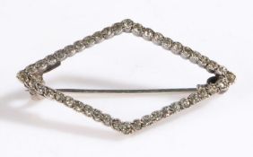 Edwardian Diamond set brooch in the form of a diamond set with round cut diamonds on a unmarked