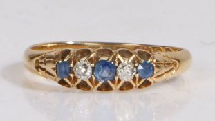 18 carat gold diamond and sapphire ring, the head set with three sapphires intersected by two