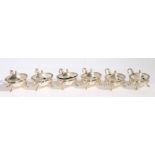 Six Elizabeth II silver mustard pots, Sheffield 1983, maker Walker & Hall, of oval form with