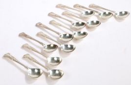 Twelve Elizabeth II silver soup spoons, Sheffield 1960 and 1983, maker Walker & Hall, with kings