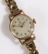 Omega 9ct gold ladies wristwatch, the signed cream dial with Arabic markers, manual wound, the