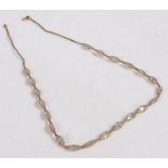 9 carat gold mesh necklace, with divides of rock crystal held within the mesh 43cm long, 7.8g