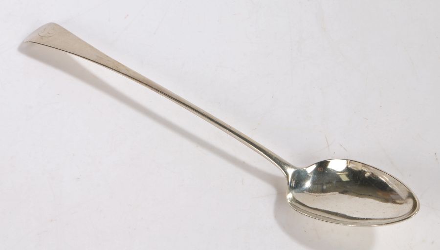 George III silver basting spoon, London 1815, maker JW, the old English pattern handle initialled C,