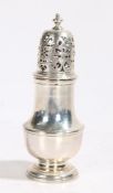 George II silver pepperette, London 1728, makers marks rubbed, with scroll pierced detachable top