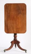George III mahogany tilt top occasional table, the rectangular top with chamfered corners above a