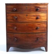19th century mahogany bow fronted bachelors chest, set with four graduating drawers, raised on