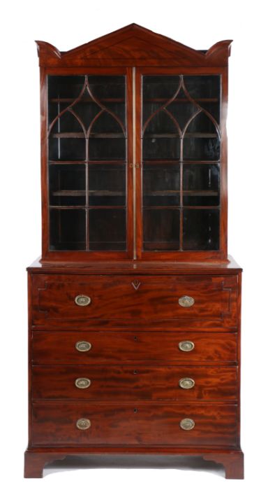 Regency mahogany secretaire bookcase, the triangular pediment above two astragal glazed doors