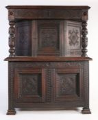 17th Century style oak court cupboard, with two scroll carved frieze drawers above a panelled