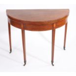 Victorian mahogany and crossbanded demi-lune tea table, the fold-over top revealing a polished