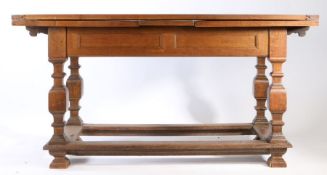 Victorian oak draw leaf table, the rectangular top with two draw leaves, raised on square
