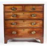 George III mahogany chest of two short and three long drawers, the sing handles with oval brass
