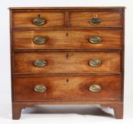 George III mahogany chest of two short and three long drawers, the sing handles with oval brass