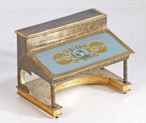 A rare 19th Century French miniature inkwell in the form of a desk, the hinged top section opening