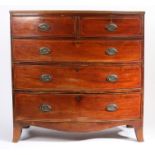 Victorian mahogany and crossbanded bow-front chest of two short and three long drawers, the swing