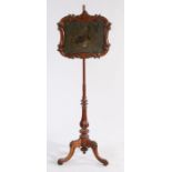 Victorian rosewood pole screen, the adjustable glazed screen with scrolled border and central
