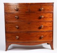 Victorian mahogany bow-front chest of two short and three long drawers, the swing handles with