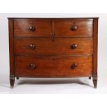Victorian mahogany bow front chest of two short and two long drawers, the drawers with turned