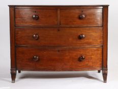 Victorian mahogany bow front chest of two short and two long drawers, the drawers with turned