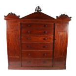 19th century mahogany compactum wardrobe, the moulded cornice above a drop front section with a