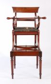 An early 19th century mahogany metamorphic child's high chair, the detachable chair top with